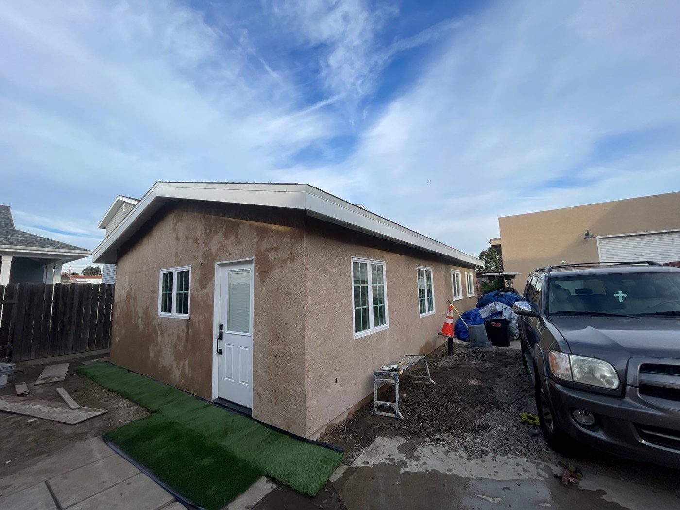 Finished detached accessory dwelling unit in a residential backyard