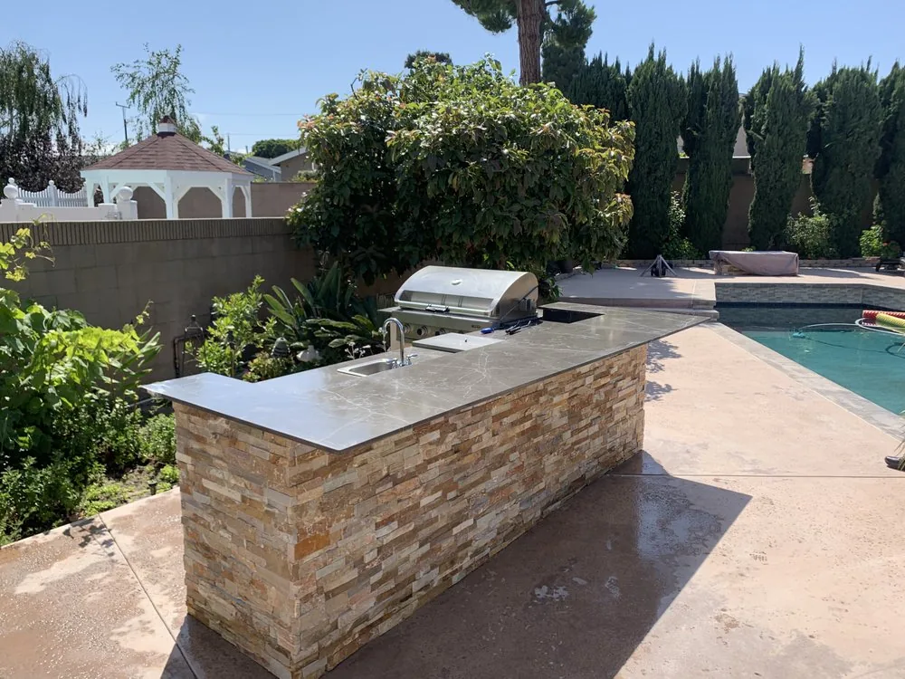 Backyard living space remodel in Torrance, CA by Ten Eight Renovations